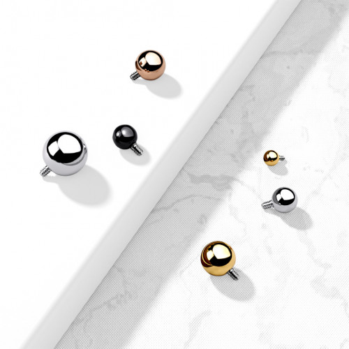 Ozdobná pozlátená gulička k dermálu