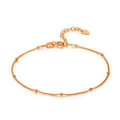 Pozlátený strieborný náramok na nohu s drobnými guličkami