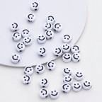 Plastový korálik smajlík